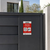 Autocollant Site protégé Daewoo apposé sur le portail d'une maison